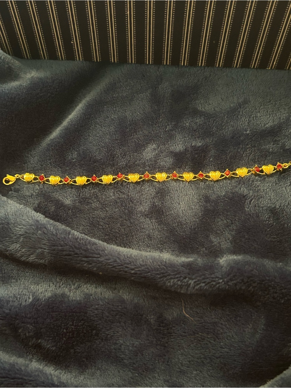 Vintage Avon Gold Tone Bracelet with Gold Hearts and Beautiful Red Gemstones